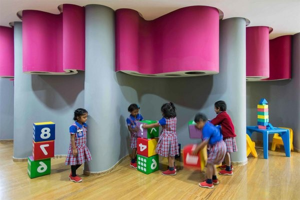 kindergarten interiors rosy accents blue wall