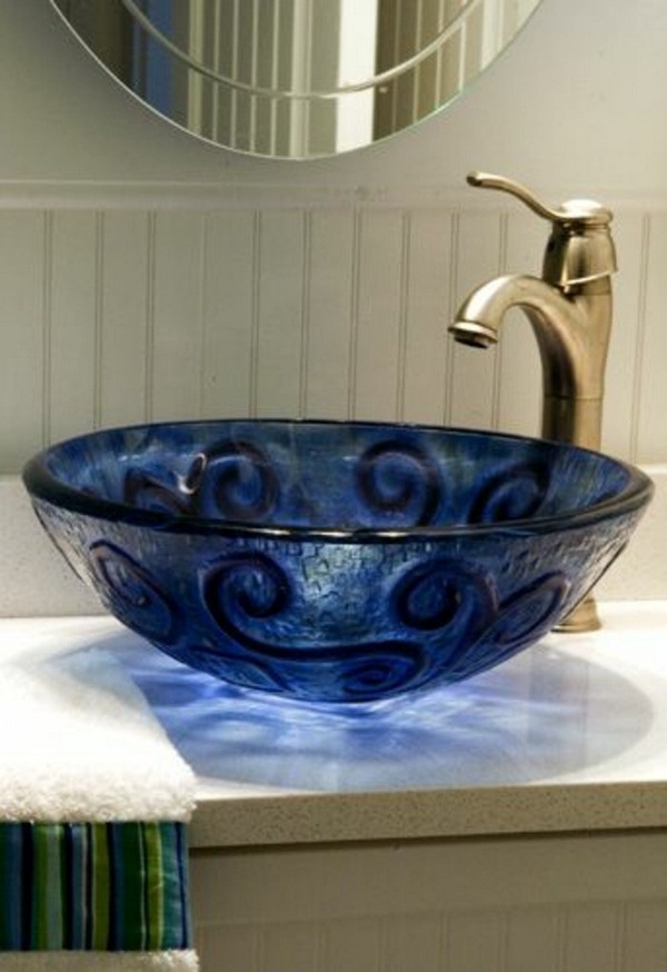 Glass washbasins painted blue