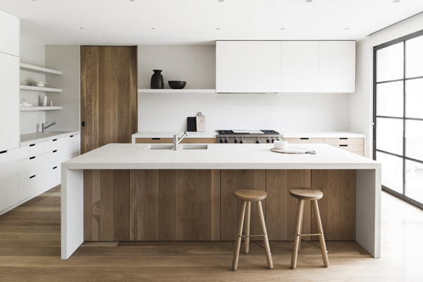 sleek modern kitchen in white + wood