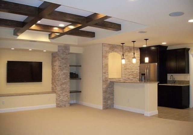 white basement ceiling with exposed beams