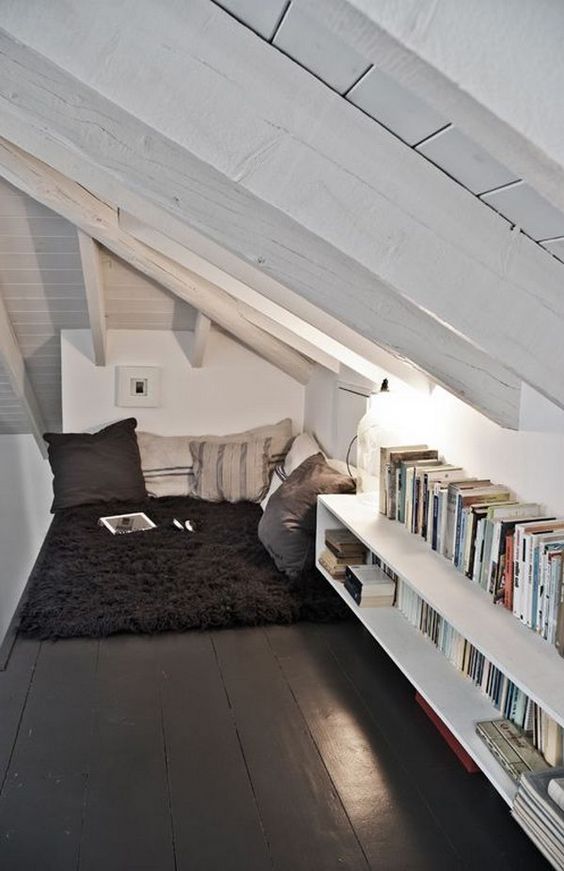 attic bookshelves fitted under the roof