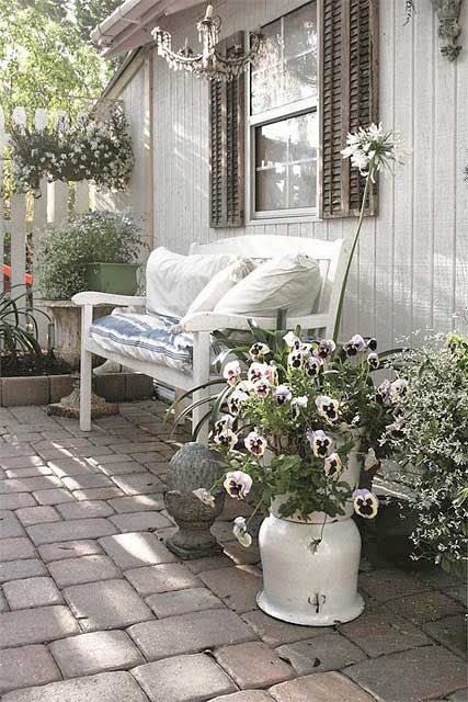 lots of potted flowers create an ambience