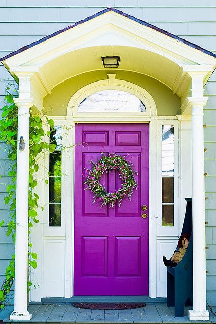 accent purple front door for a contrast