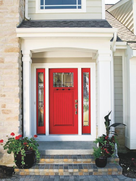 bold red door with red framed sidelights