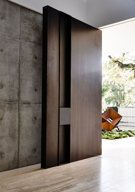 modern oversized dark stain wooden door