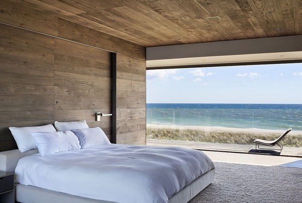 1-bedroom-interior-design-with-ocean-sea-view-panoramic-windows-bed-wooden-walls-ceiling