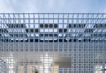 Latticed framework incorporates seating around the edges of Shenzhen hotel and cultural centre