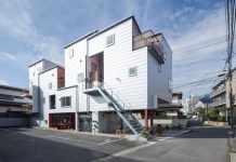 Balconies and courtyards puncture Japanese apartment building