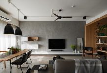 Wall of concrete optics and timber cladding inside for a stylish interior