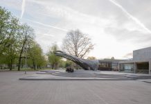 Drones and robots weave carbon-fibre pavilion based on moth webs