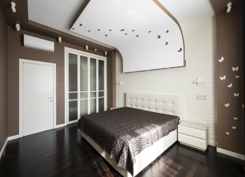 Elegant taupe bedroom with neutral tones and cozy bedding