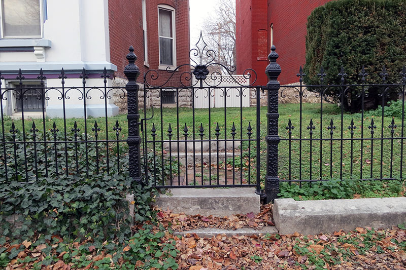 Decorative wrought iron garden fence
