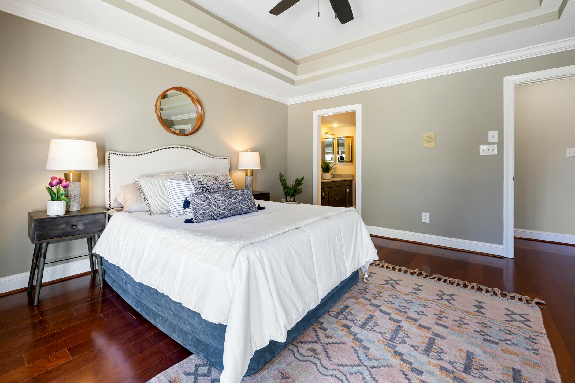 A stylish modern bedroom featuring elegant décor and lighting, perfect for interior design inspiration.