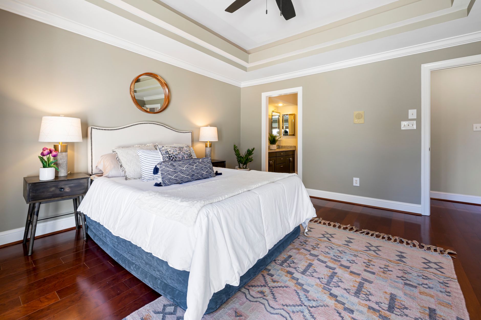 A stylish modern bedroom featuring elegant décor and cozy atmosphere