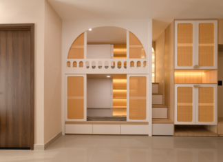 9 Small Space Storage Hacks That Keep Your Home Clutter-Free and Stylish Stylish minimalist interior with integrated storage solutions and warm lighting.