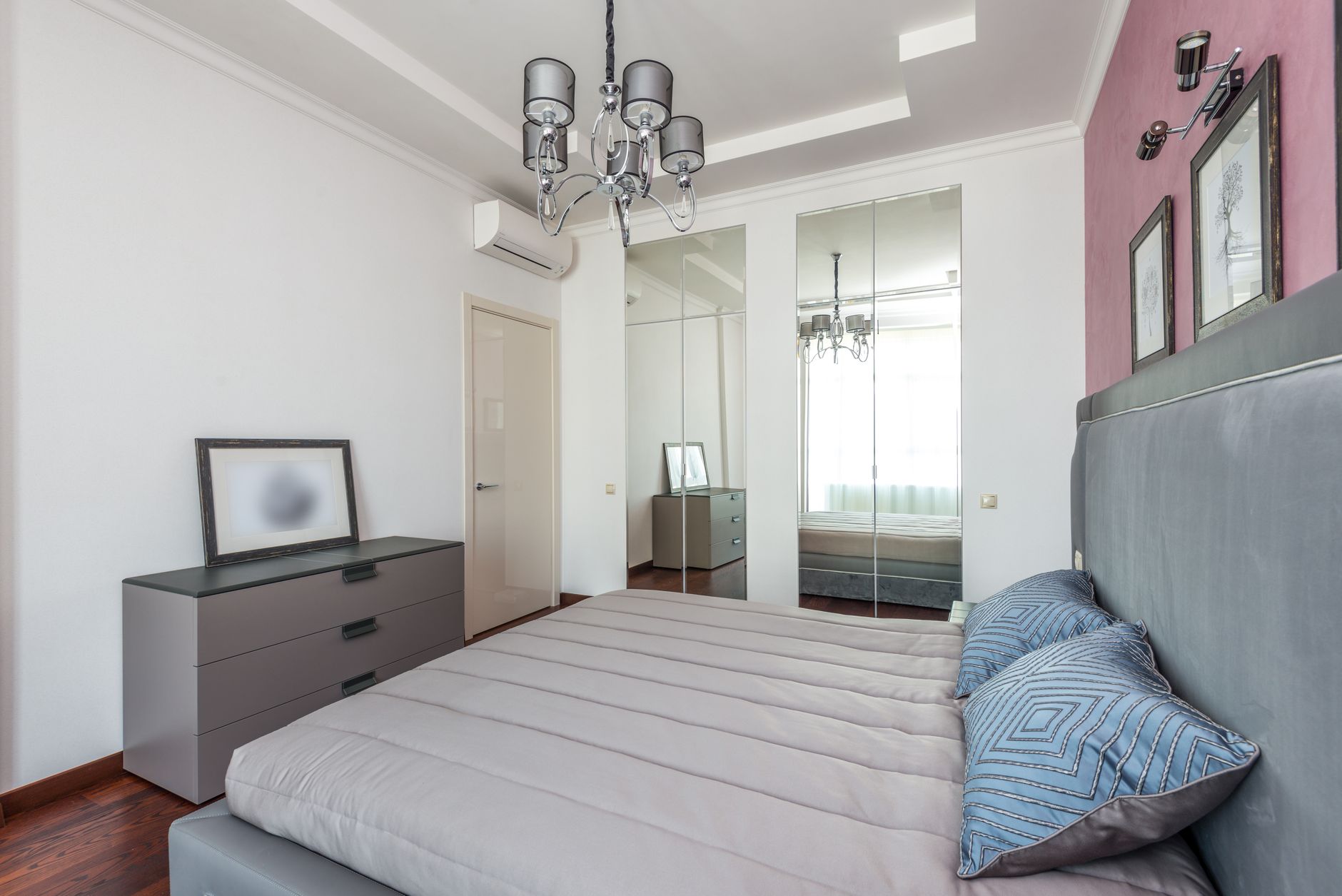 Bright contemporary bedroom featuring stylish decor and natural light