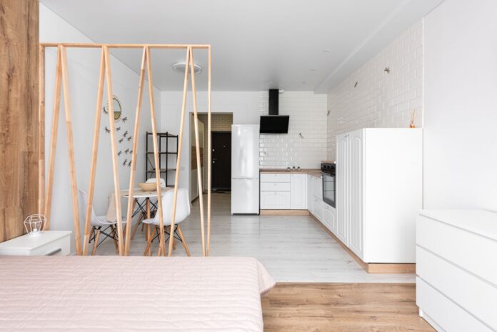 Small modern living room with clever space-saving furniture arrangement