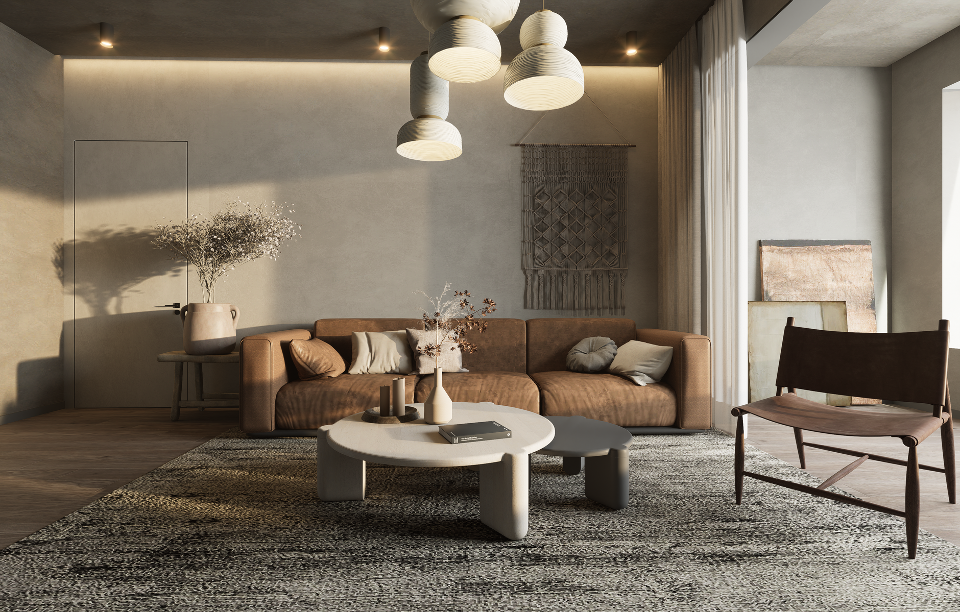 Modern living room with brown sofa, pendant lights, and elegant decor.