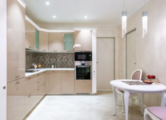 9 Small Dining Area Ideas That Fit Beautifully in Tight Spaces Classic styled round table and chair and minimalist furniture with built in appliances in modern kitchen