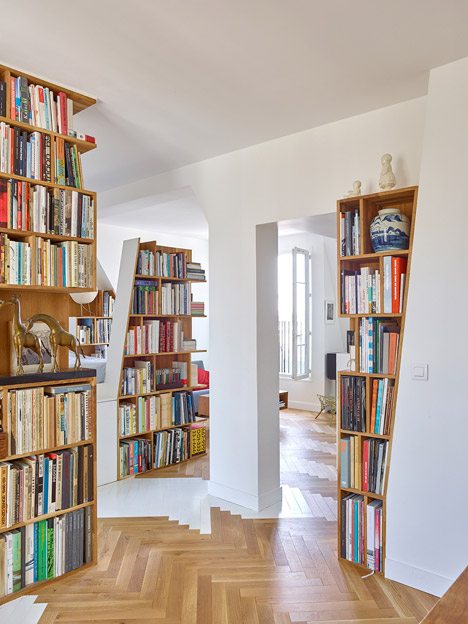 H2o Architectes Adds Sloping Shelving Units To A Book Collector’s Parisian Loft Apartment