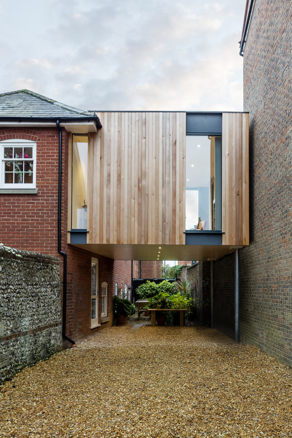Adam Knibb Builds Timber House Extension Above A Driveway