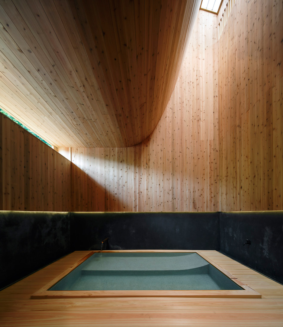 Kubo Tsushima Architects Creates Curved Cedar Interior Inside Japanese Bathhouse