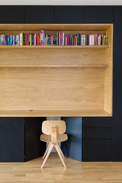 Wooden Niches Contain Work Surfaces And Storage Inside Black Line Apartment By Arhitektura D.o.o