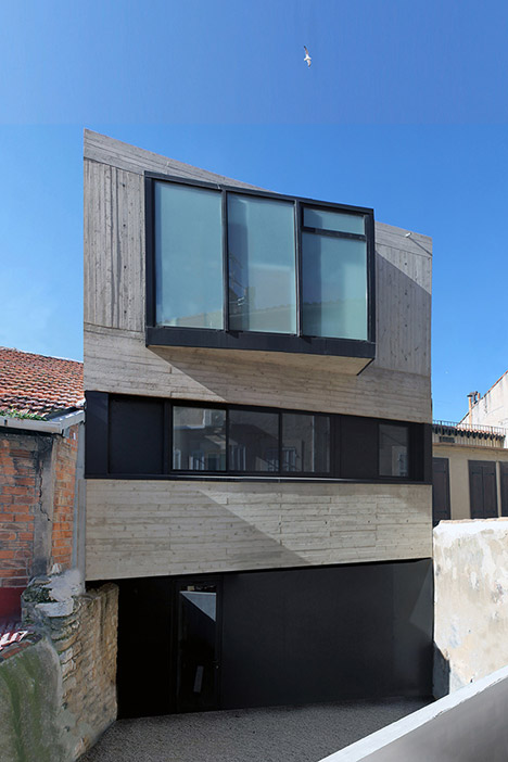 Marseille House By ACAU Architects Features Board-marked Concrete And An Angular Window