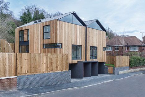 Twin Wooden Houses By Adam Knibb Architects Are Raised Up Above Street Level