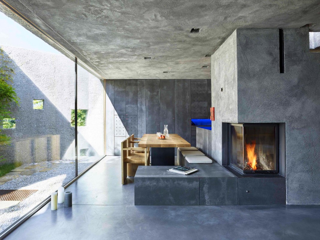 Tiny Concrete Bunker Opens to a 3-Story Home Filled With Light
