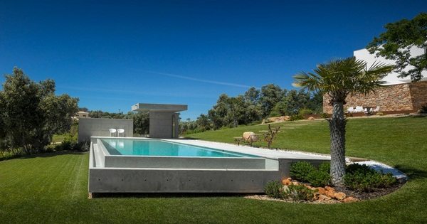 Infinity Concrete Pool As A Minimal Accent In The Garden
