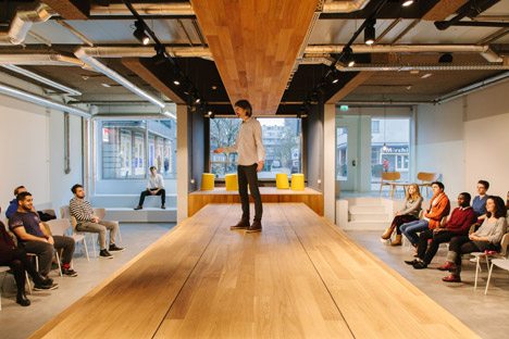 Wooden Catwalk Installed In Conference Room To Encourage Livelier Presentations