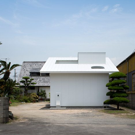 Japanese House Extension By Container Design Is Arranged Around A Covered Courtyard