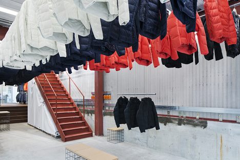 Clothes Descend From The Ceiling At Schemata Architects’ Descente Blanc Tokyo Store