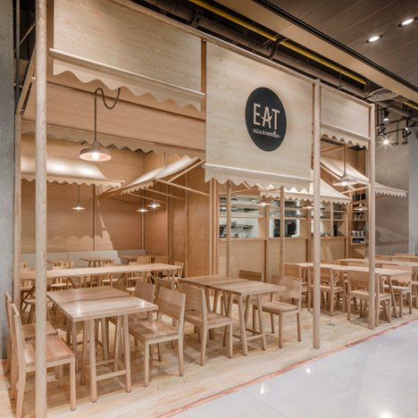 Onion Uses Solid Ash And Plywood To Create A Monochrome Restaurant Interior In Bangkok