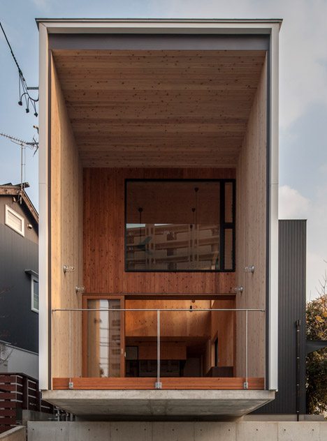Fly Out House Balances On A Concrete Wall To Avoid Overlooking A Busy Road