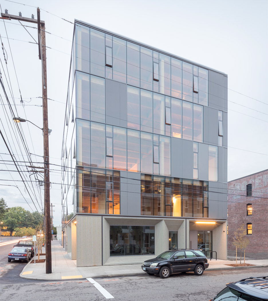 Glass Facade Reveals Timber Structure Of Frame Work Building In Portland