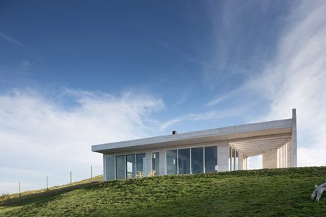 HLM House By Rafael Lorentz Is A Hilltop Brazil Residence Built From White Concrete