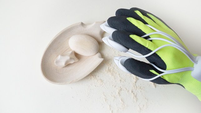Electric Happaratus Glove Enables Wood And Stone To Be Sculpted By Hand