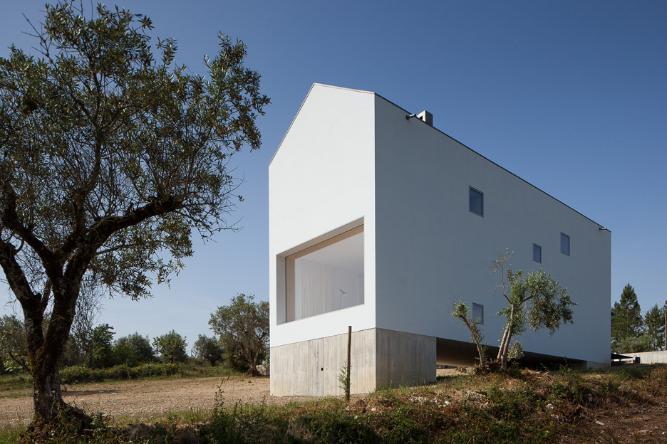 João Mendes Ribeiro Slots Concrete Wine Cellar Below Gabled House In Rural Portugal