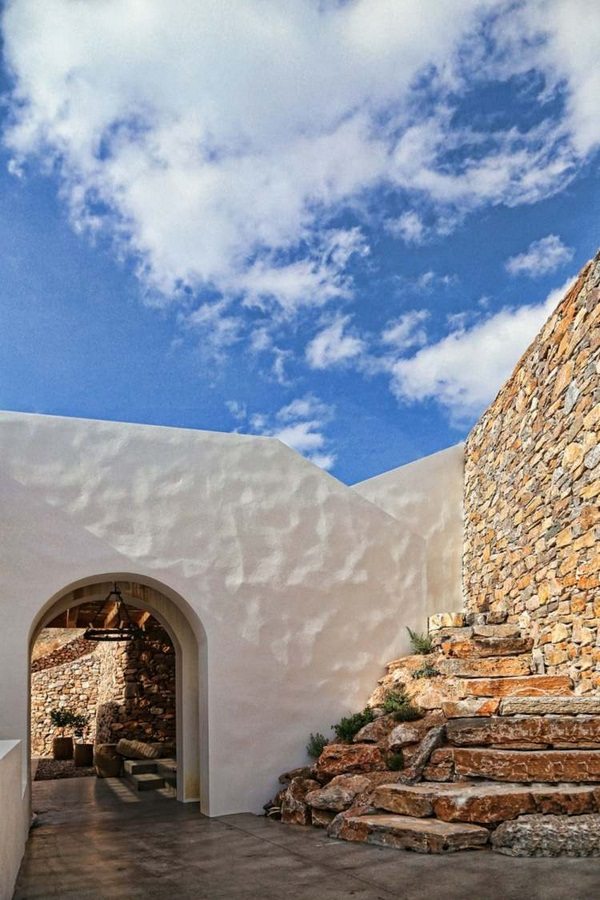 House With White Stone Facade On The Cyclades Island