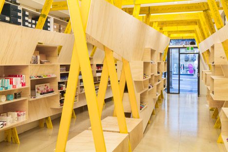 Tandem Installs Elaborate Wooden Shelving Inside Hugg Health And Footwear Store