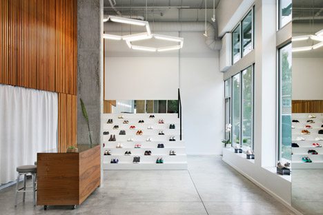 Sneakers Are Displayed On Bleachers In Seattle Boutique By Best Practice Architecture