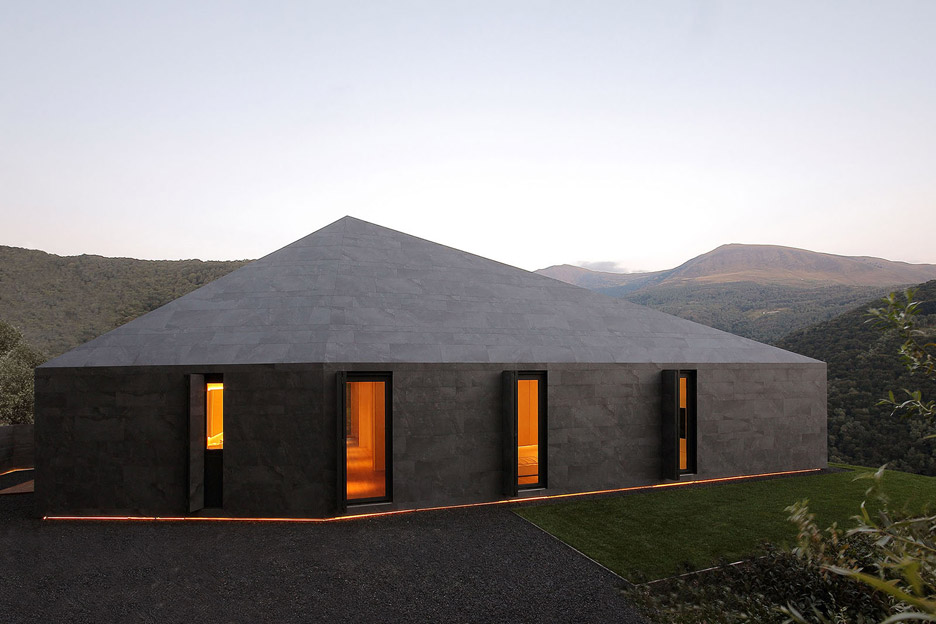 Faceted Home In The Swiss Alps By JM Architects Is Covered In Dark Grey Tiles