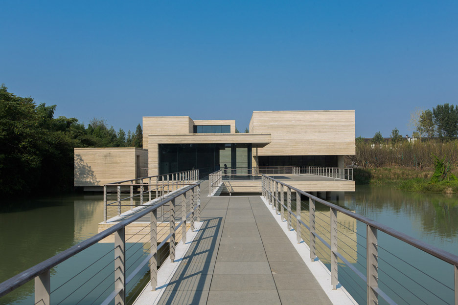 Mu Xin Art Museum By OLI Architecture Sits Over A Lake In Eastern China