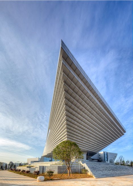 Qujing History Museum In China Features A Roof Shaped Like An Upside-down Staircase