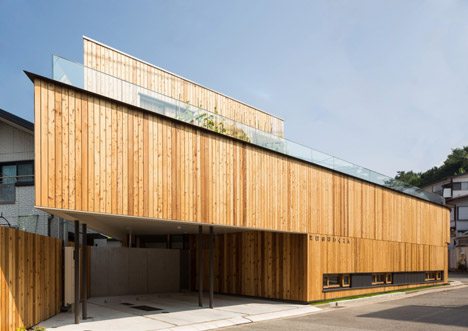 Takeno Nursery By Suga Architects Office Hides A Two-storey Garden Behind Its Wooden Walls