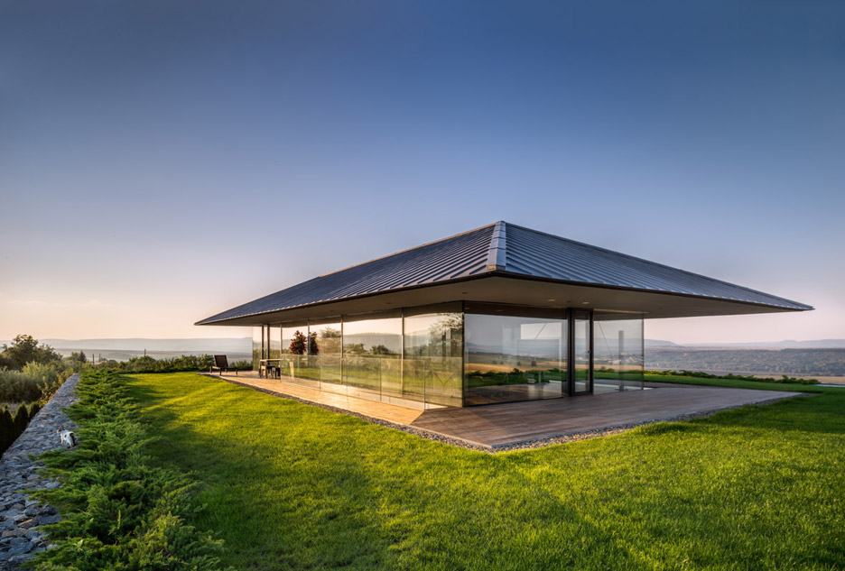 Observation House By I/O Architects Features Gabion Walls And A Grassy Viewing Deck
