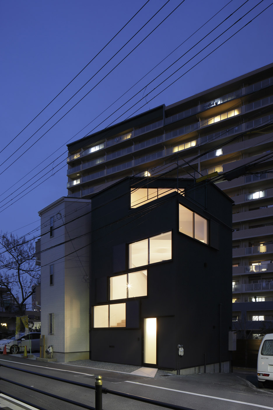 Windows Spiral Towards The Roof Of Osaka House By Alphaville Architects