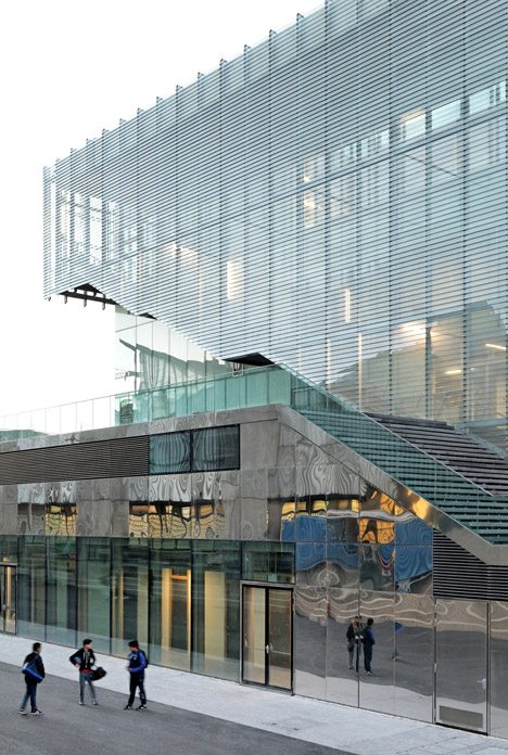Jules Ladoumègue Sports Centre Features A Facade Of Moving Glass Shutters